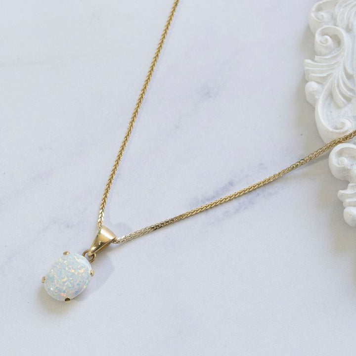 14K Yellow Gold Elliptic White Opal 8X10mm Pendant