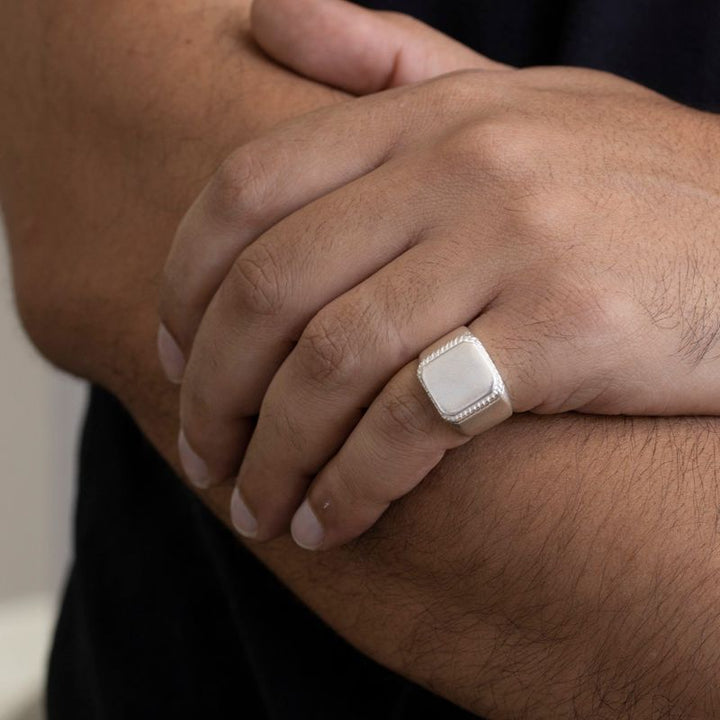 Men's Silver Signet Ring with Swirled Engravings around Square