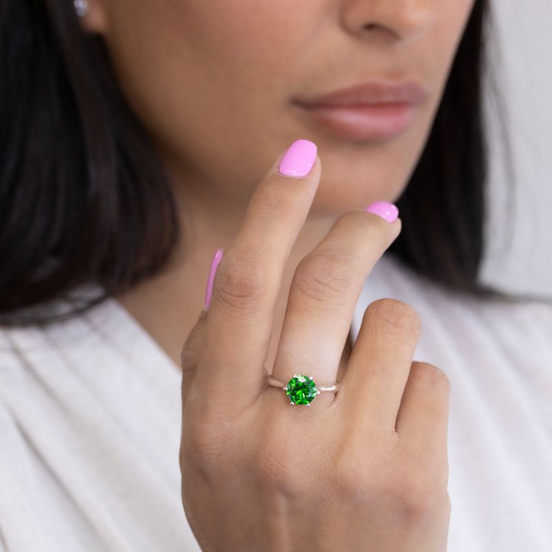 silver closed ring with green cz 8mm facet