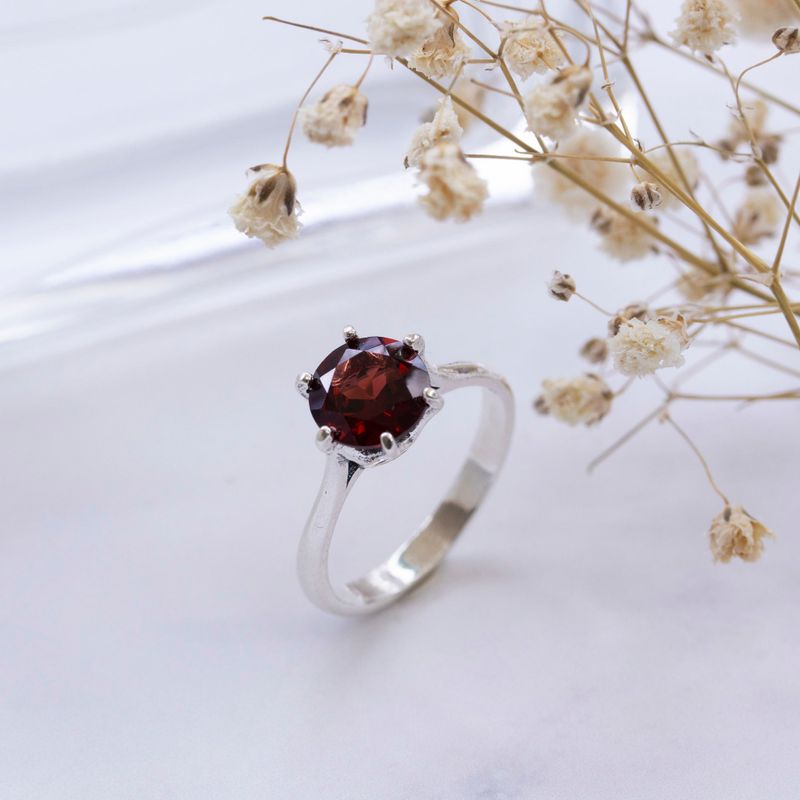 silver closed ring with garnet 8mm facet