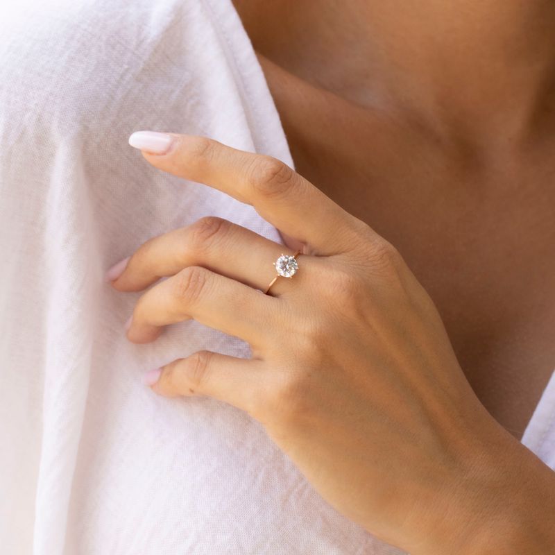 Rose gold ring with white zircon 7 mm facet