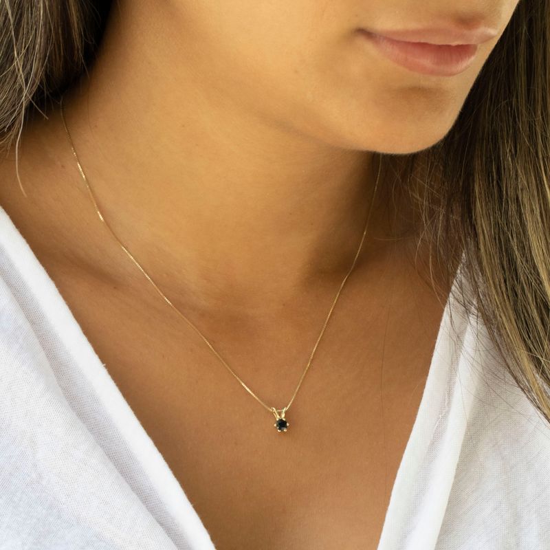 A 14 -Carat Gold Jessica Pendant In a 4mm Black Diamond Inlay