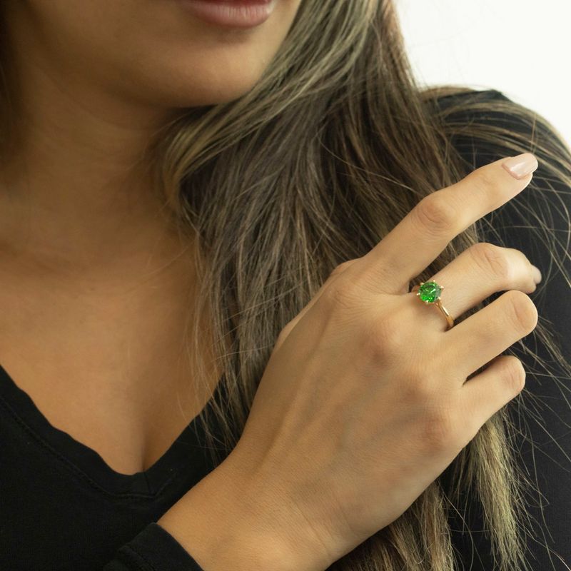gold plated closed ring with green cz 8mm facet