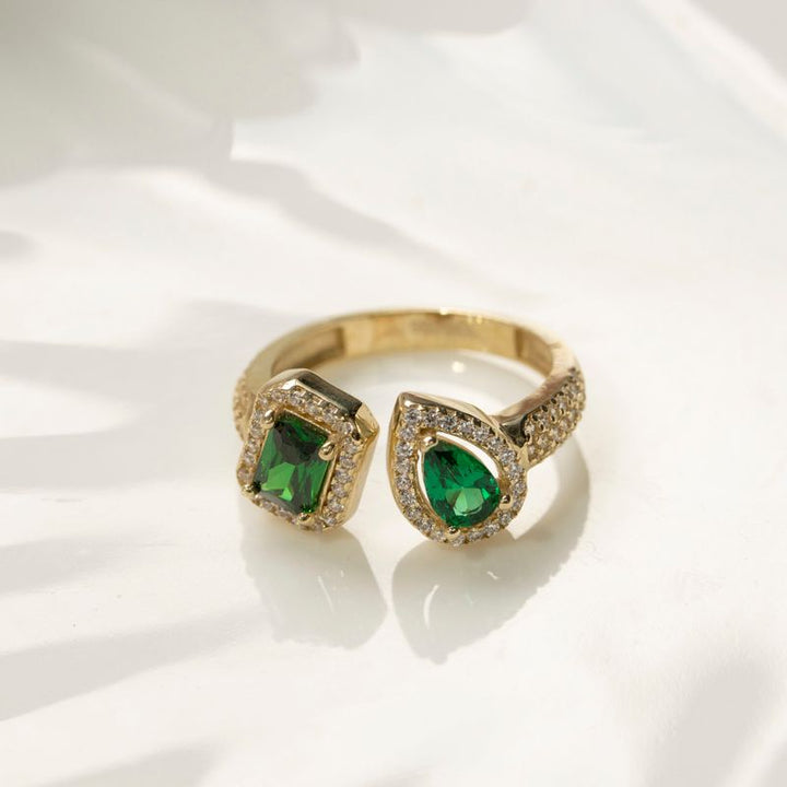 yellow gold open ring white zircons with green drop and rectangular zircon
