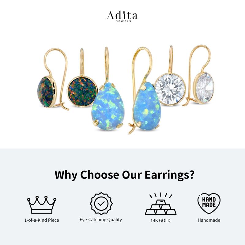 Yellow gold drop dangling earrings white zircons and blue zircon in the center