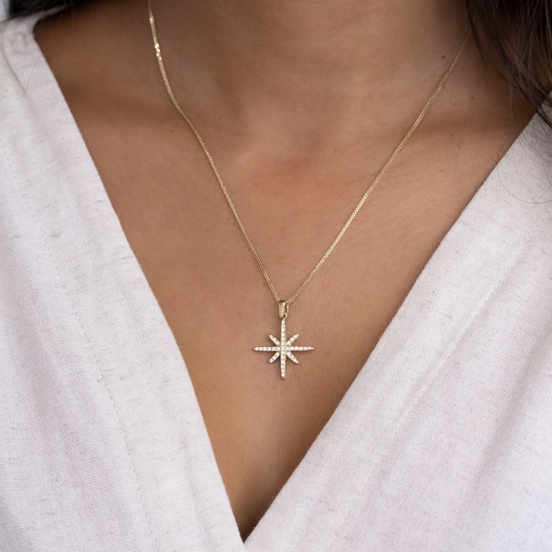 Gold Pendant North Star with Small Zirconia Stones