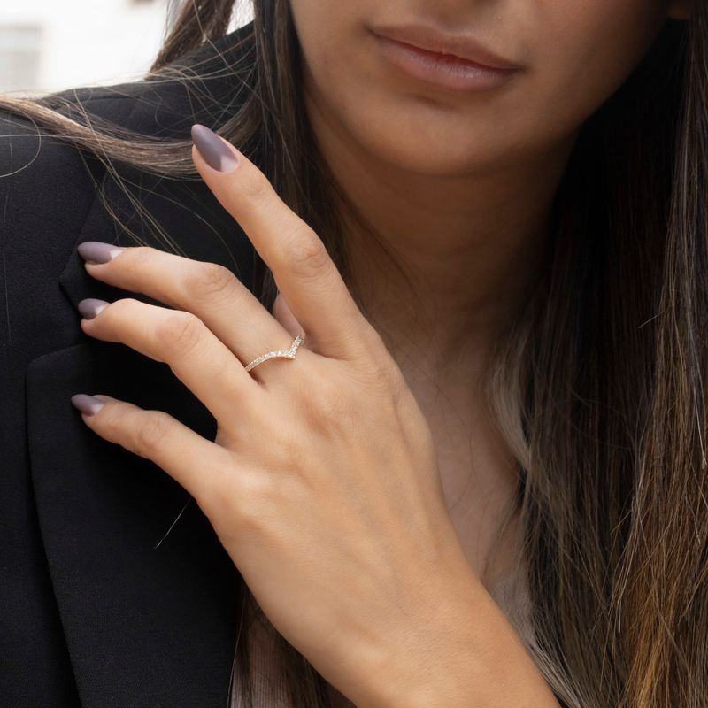 Yellow gold arrow shaped ring inlaid with white zircons