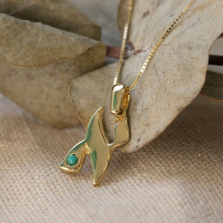 Small letter A pendant yellow gold inlaid with turquoise stone