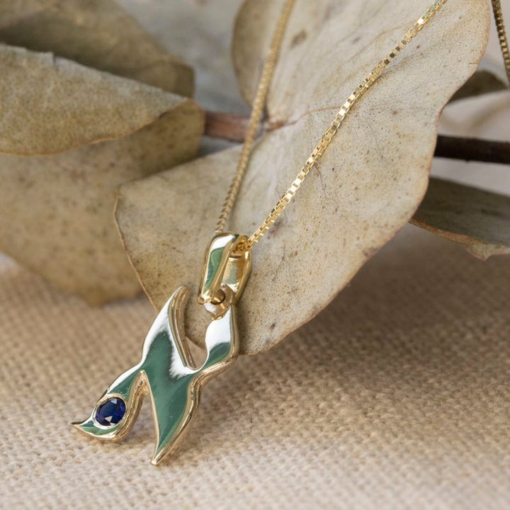 Small letter A pendant yellow gold inlaid with a blue zircon stone