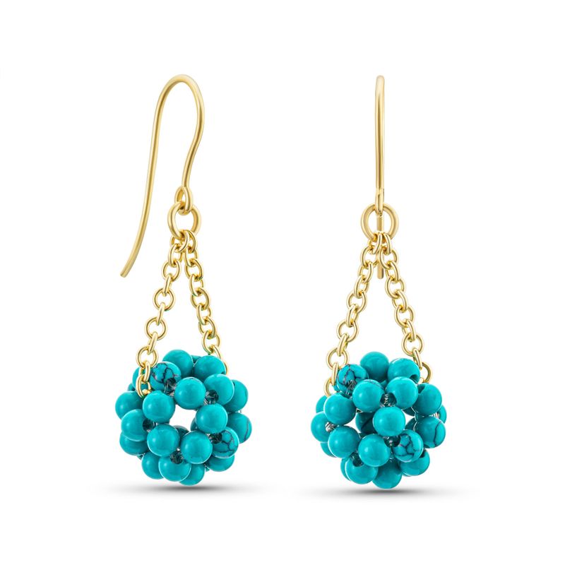 Yellow gold earrings with turquoise beads in a ball