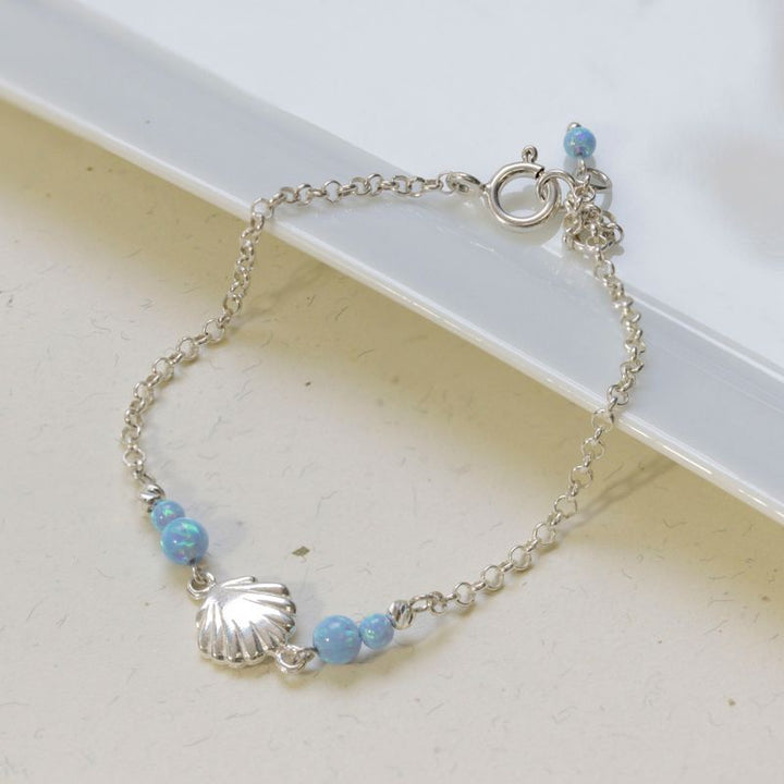Silver Seashell Beaded Bracelet with Blue Opal Beads