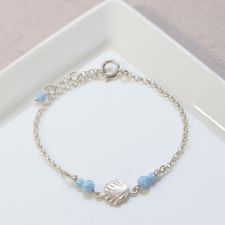Silver Seashell Beaded Bracelet with Blue Opal Beads