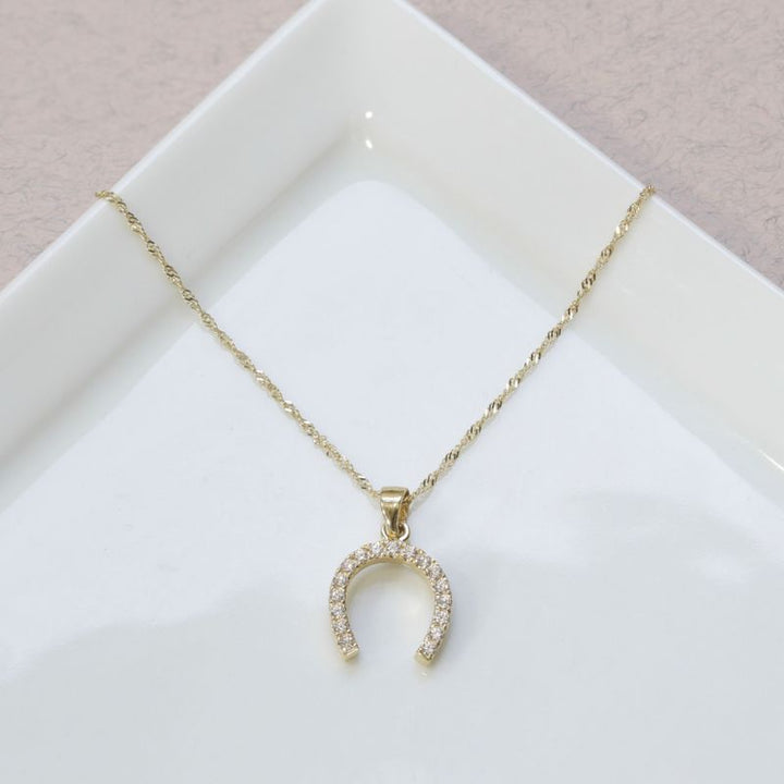 Encrusted Horsested 14K Gold Pendant