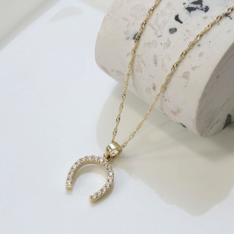 Encrusted Horsested 14K Gold Pendant