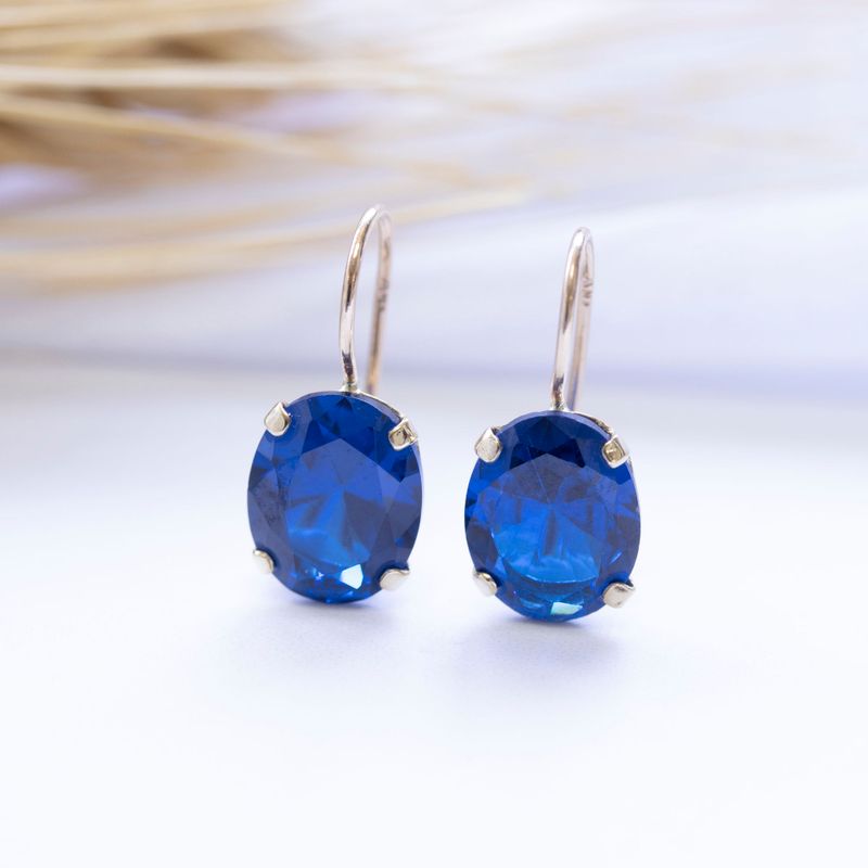 14K Gold Blue CZ 8X10mm Oval Dangle Earrings