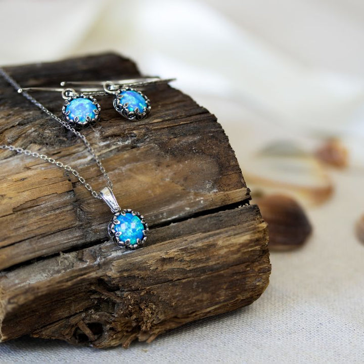 Silver Round Pendant Inlaid with Blue Opal