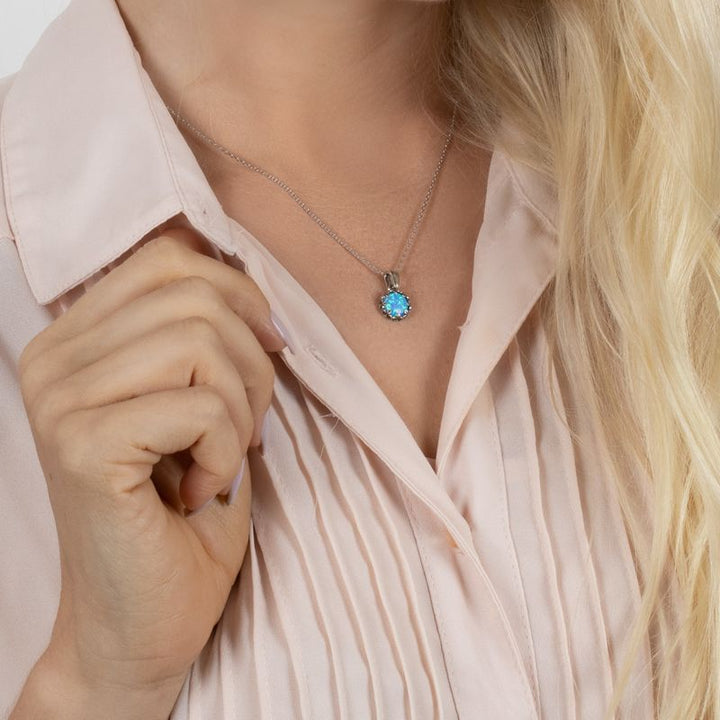 Silver Round Pendant Inlaid with Blue Opal