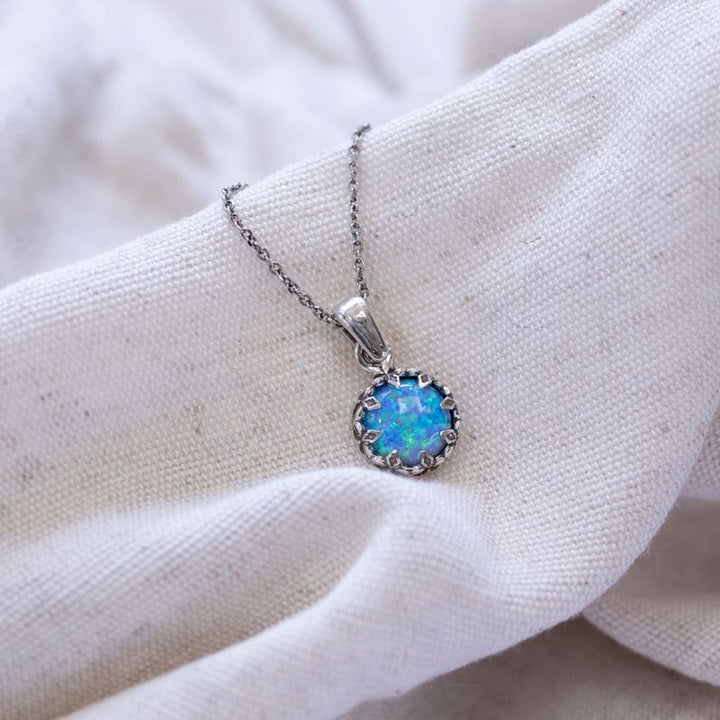 Silver Round Pendant Inlaid with Blue Opal