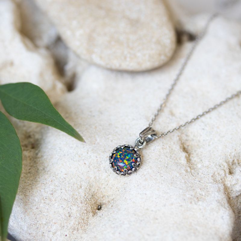Silver Round Pendant Inlaid with Black Opal